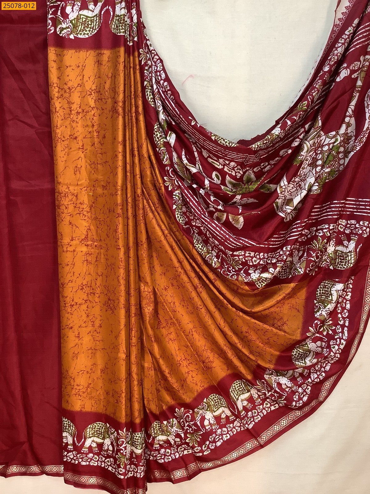Orange Fancy crepe silk printed sarees