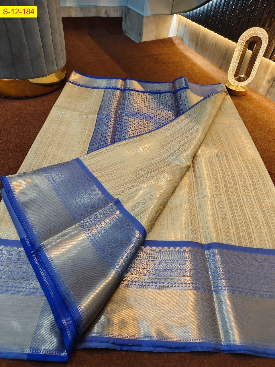 Half White Banarasi tissue soft silk sarees