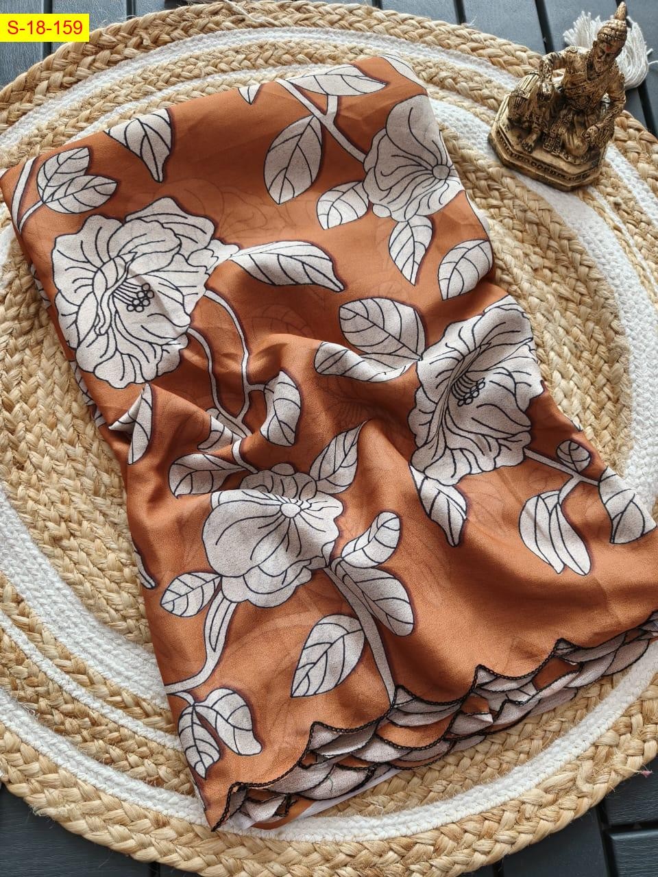 Brown Georgette marshmallow leaf printed sarees