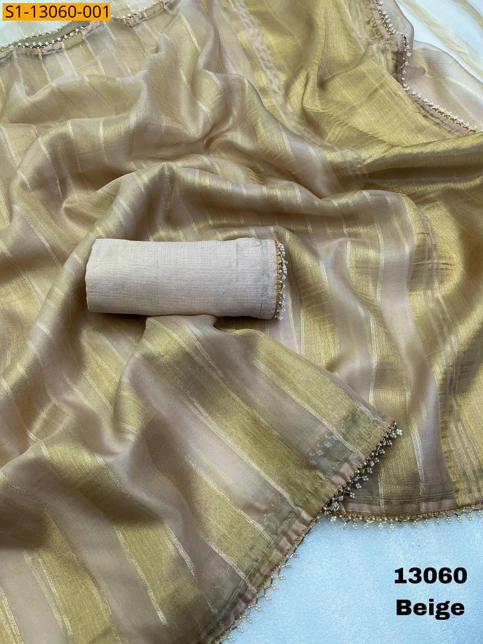 Beige Celebrity inspired gold tissue silk Sarees