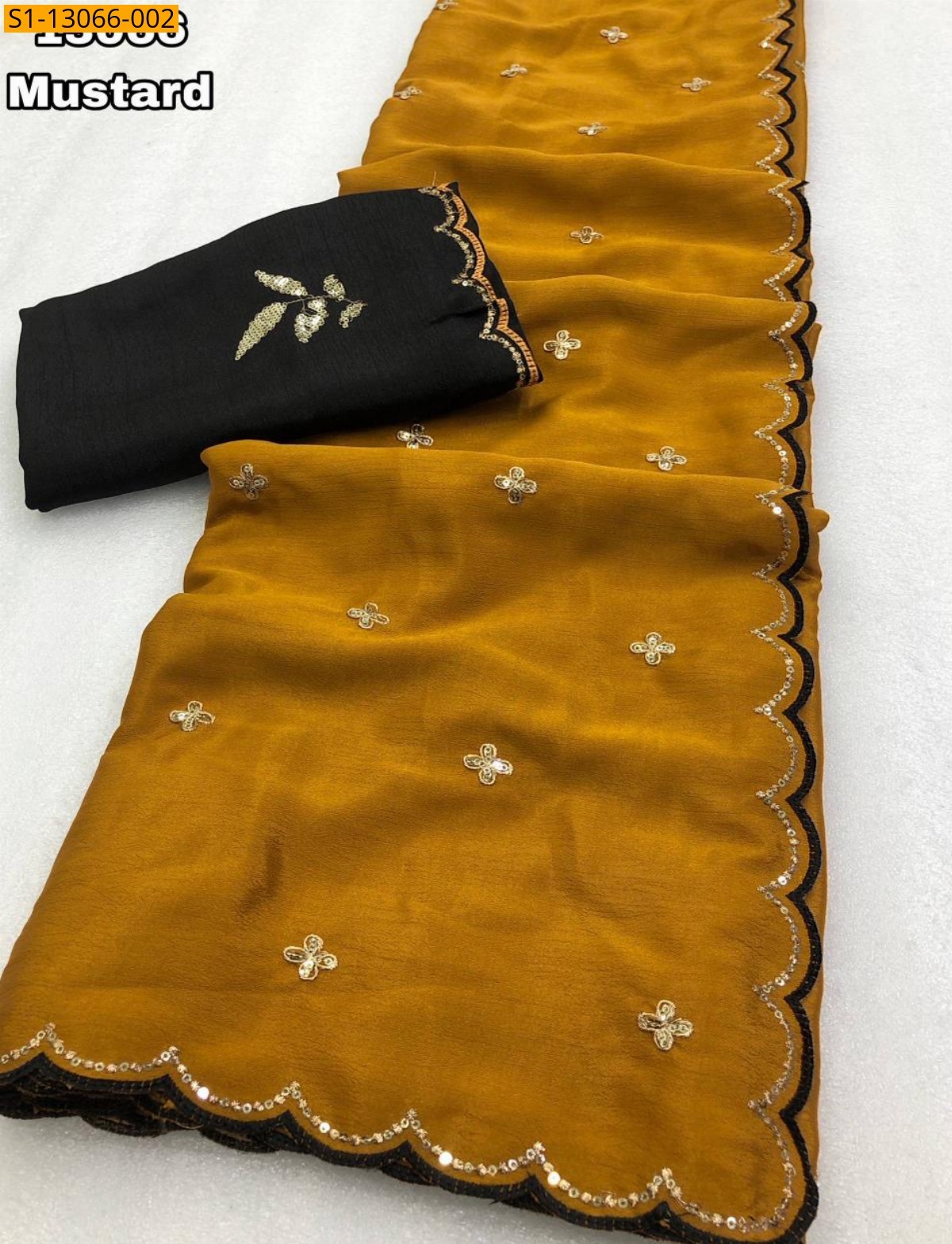 Musterd Fancy Soft Chinnon Embroidery Work Sarees