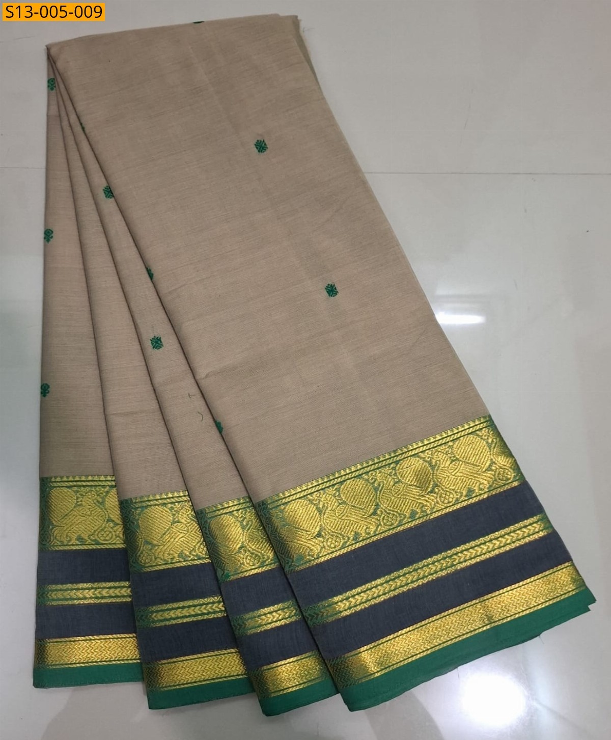 Cream Fancy kanchi cotton sarees 