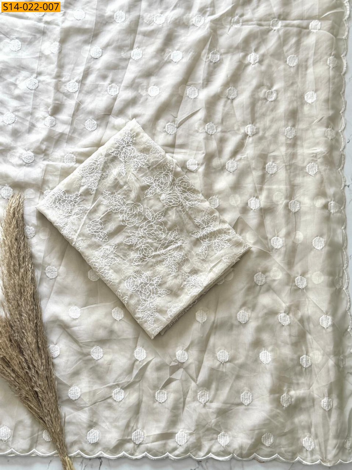 Half white Tebby organza polka dots saree