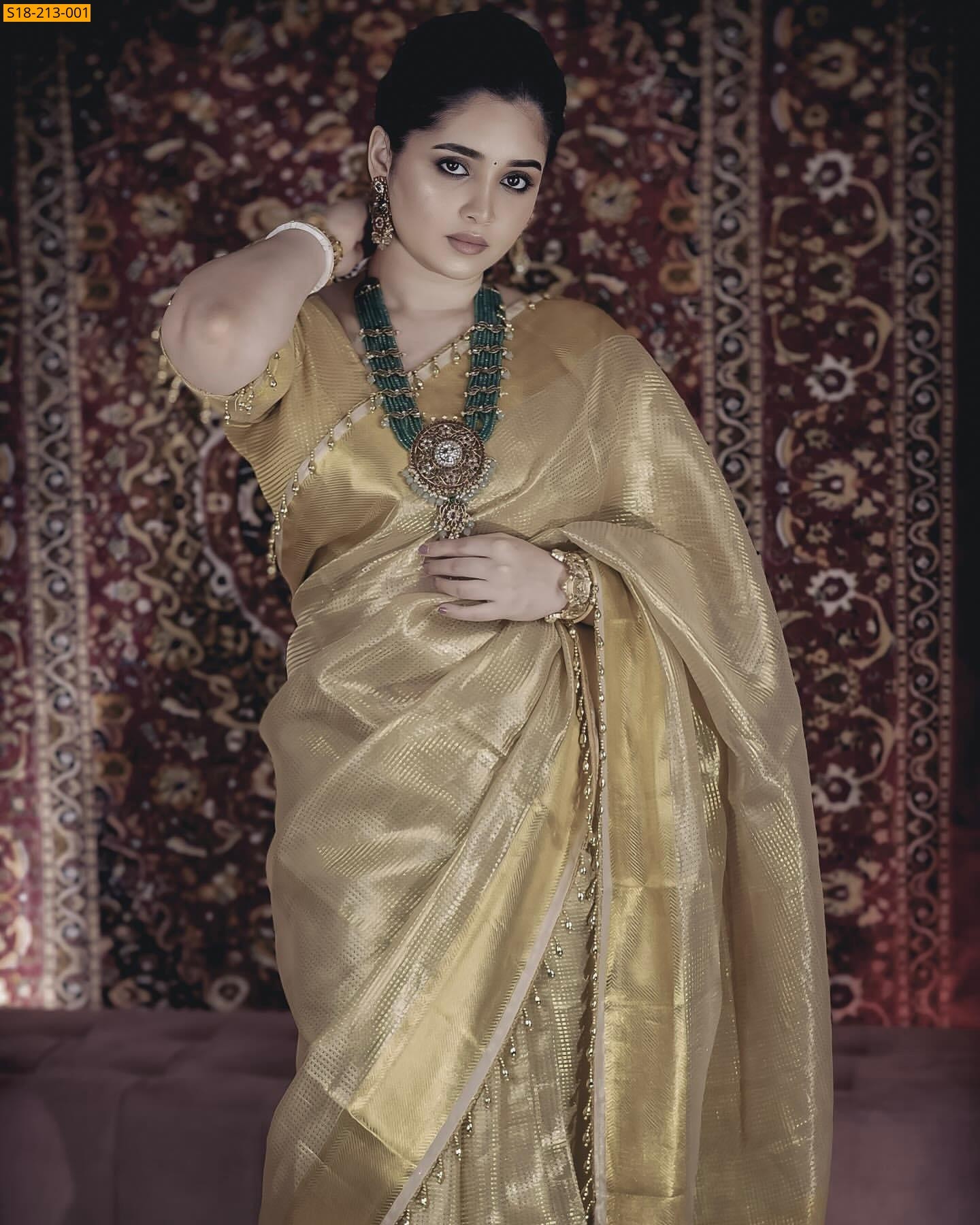 Gold Nayanthara inspired tissue silk saree