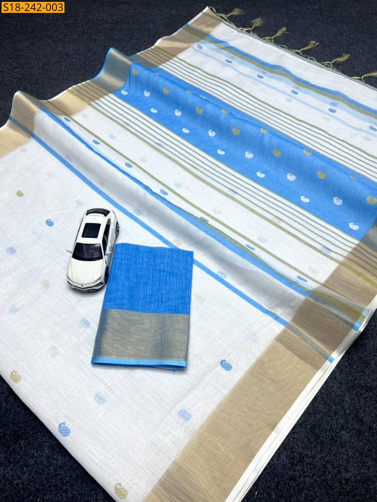 White with Blue Linen printed sarees