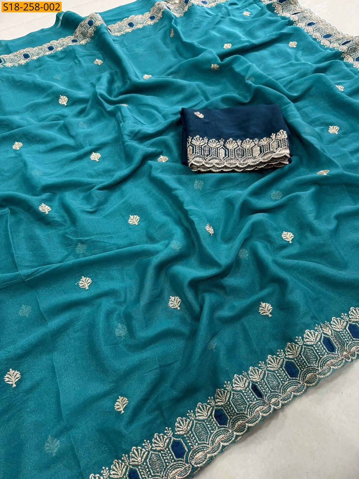Teal Fancy Star Georgette Saree