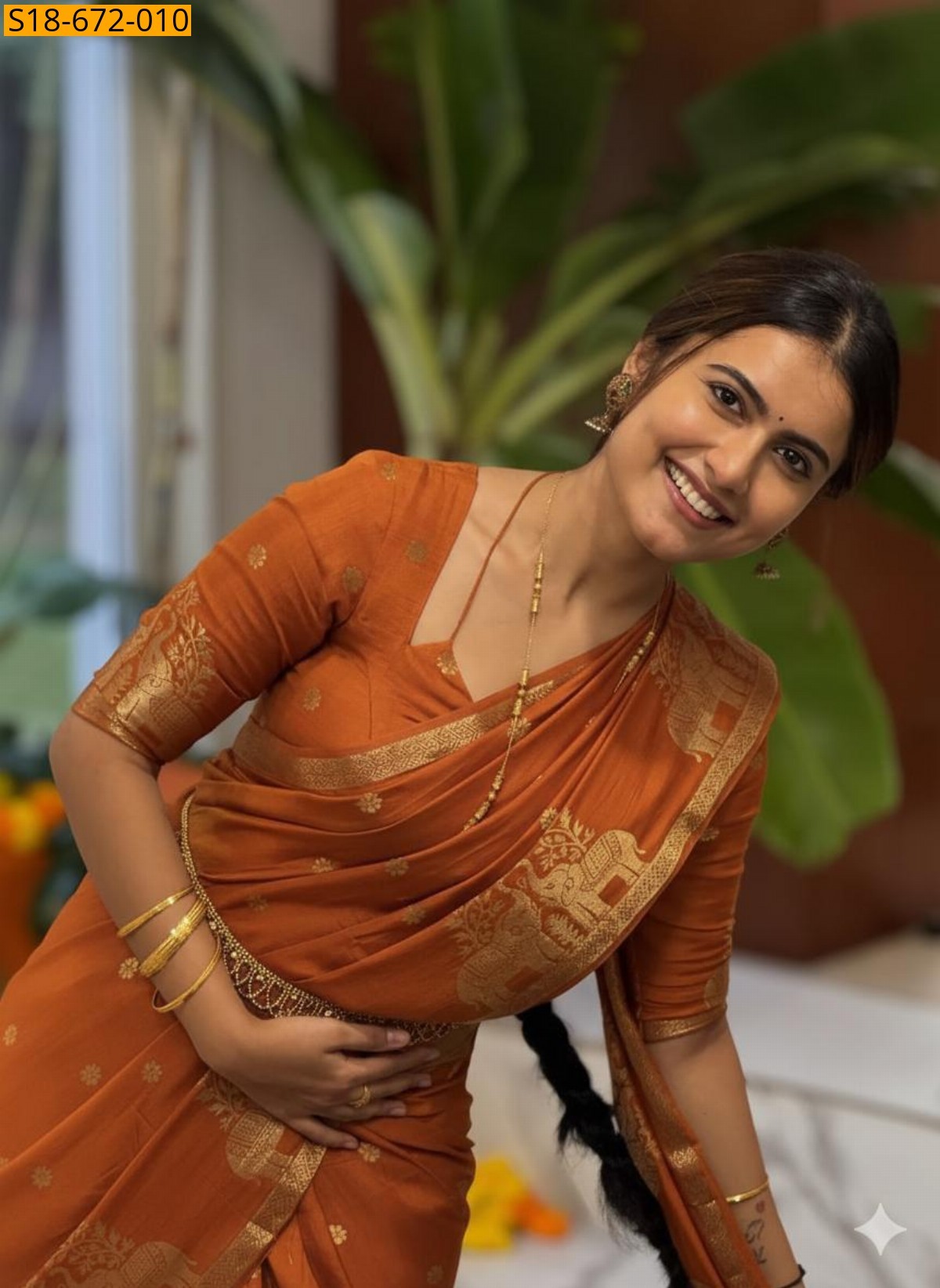 Rust Orange Fancy Muslin Silk Saree