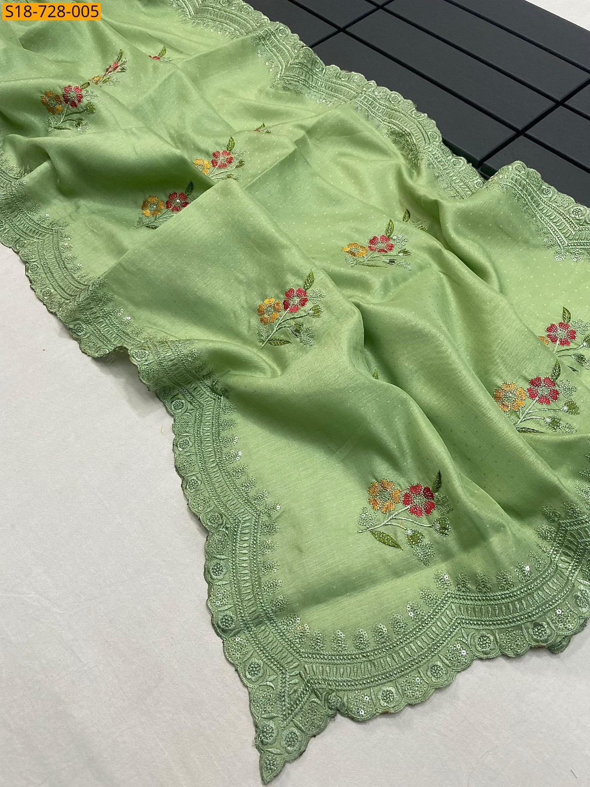 Green Tussar dobby embroidery work sarees