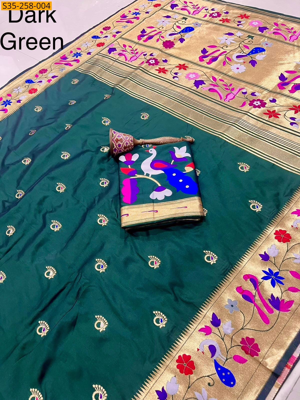 Dark green Fancy Paithani silk saree 