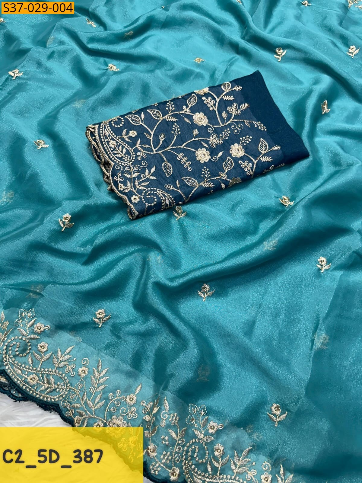 Peacock Blue Fancy Star Georgette Sarees