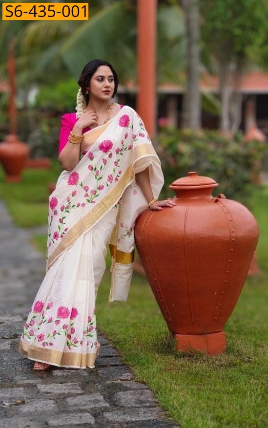 Haif white Fancy kerala linen with gold zari saree