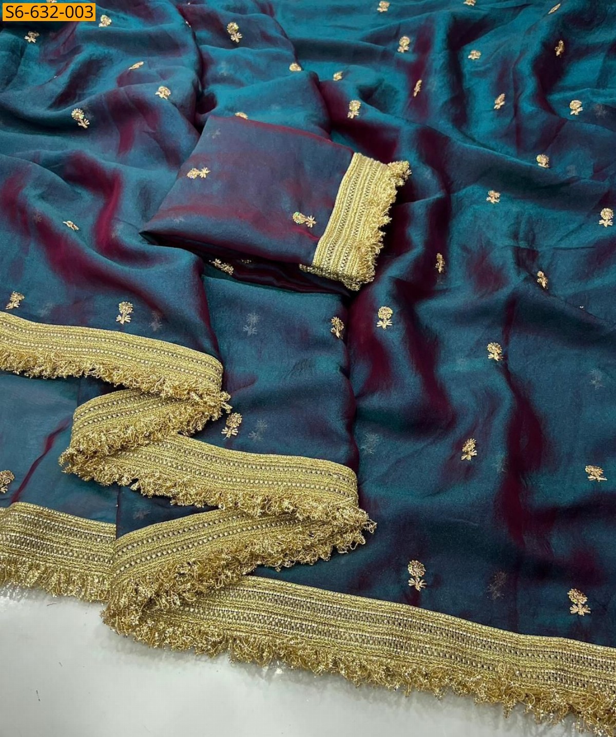 Peacock green Space satin embroidery saree