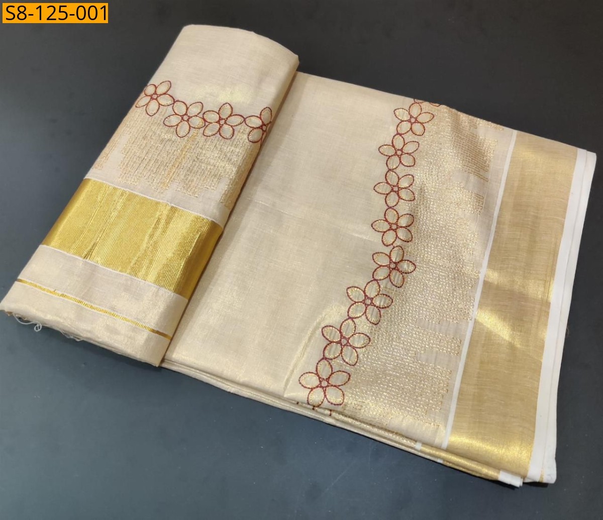 Flower shed golden tissue embroidered saree - Half white